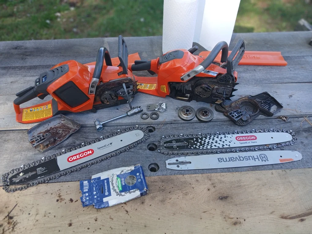 2 light weight husqvarna chainsaws.webp